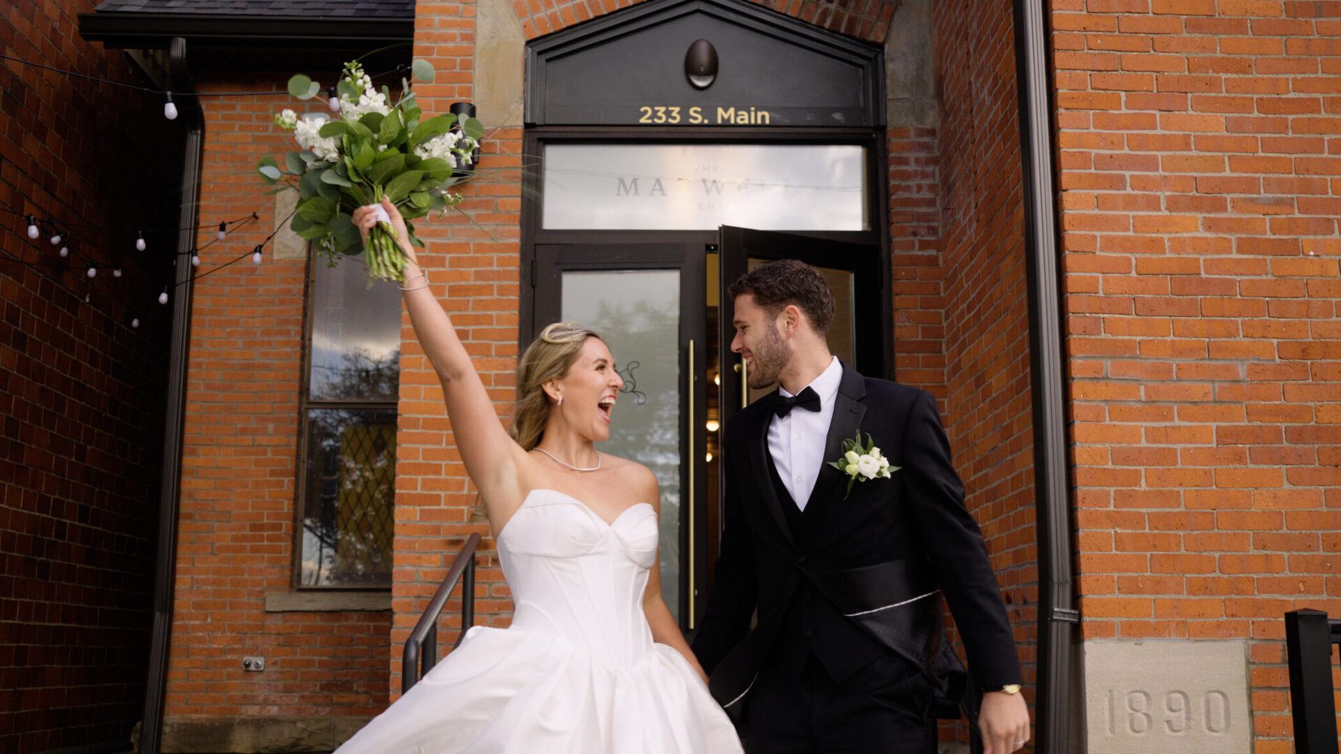 Bride and groom exiting The Maxwell